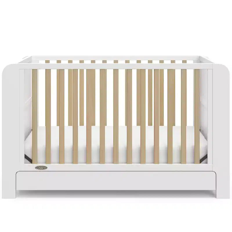 Graco Read-with-Me 4-in-1 Convertible Crib with Drawer