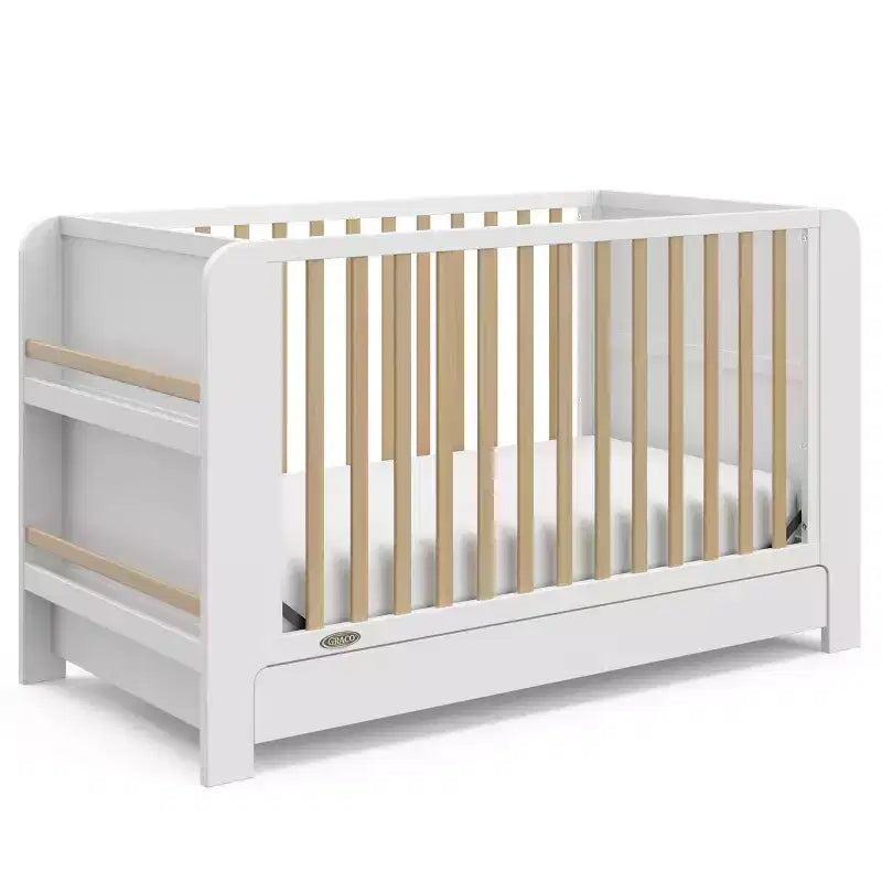 Graco Read-with-Me 4-in-1 Convertible Crib with Drawer